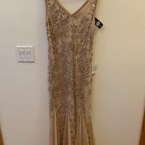 Long formal gown, champagne color.